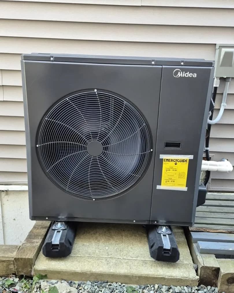 Midea outdoor heat pump on anti-vibration feet